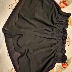 Black pleated shorts